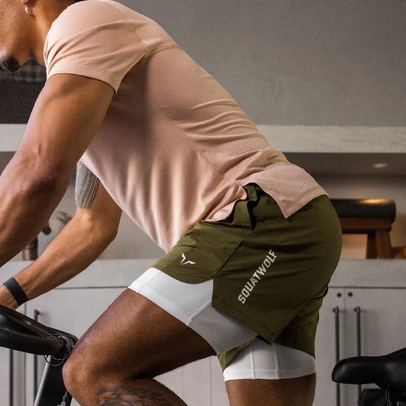 Men's zip - pocket canvas shorts for added functionality during travelEssential 5" Pro 2-In-1 Shorts - Dark Olive Men's zip - pocket canvas shorts for added functionality during travelEssential 5" Pro 2-In-1 Shorts - Dark Olive