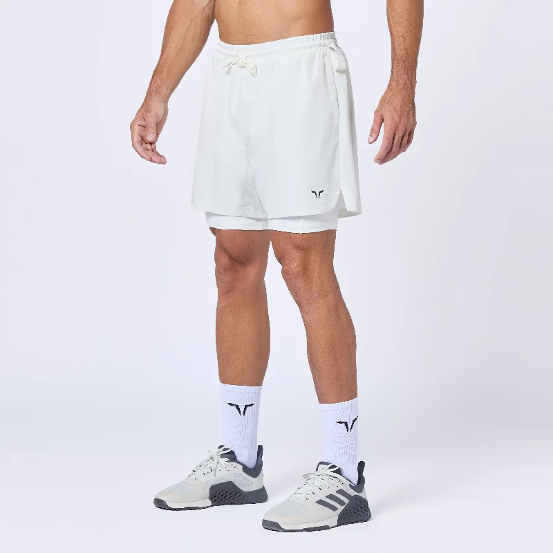Men's pastel - colored cotton shorts for a spring - friendly outfitEssential 5" Pro 2-In-1 Shorts - Pearl White Men's pastel - colored cotton shorts for a spring - friendly outfitEssential 5" Pro 2-In-1 Shorts - Pearl White