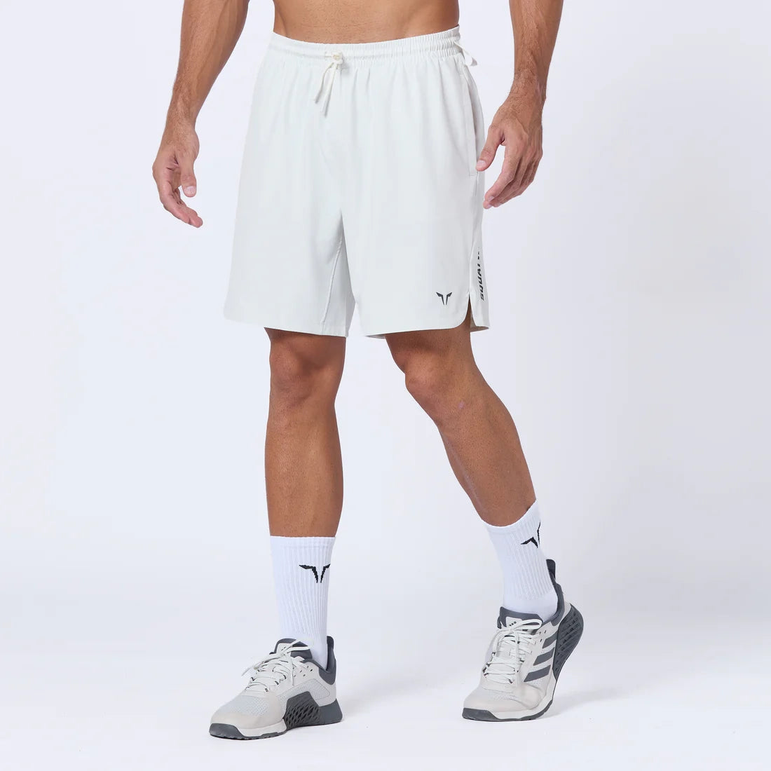 Men's ripped denim shorts for a trendy streetwear aestheticEssential Pro 7 Inch Shorts - Pearl White Men's ripped denim shorts for a trendy streetwear aestheticEssential Pro 7 Inch Shorts - Pearl White