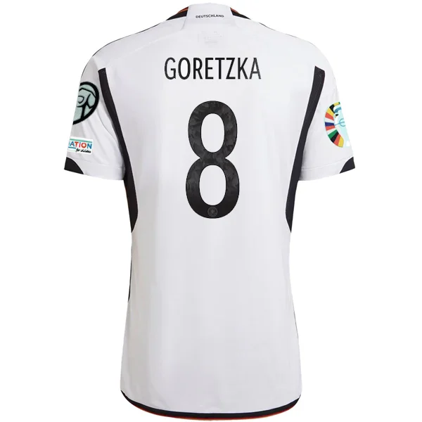 Men's Retro Hockey Jerseys with Classic Stripes and Logos for a Nostalgic Hockey Aestheticadidas Germany Mario Leon Goretzka Home Jersey w/ Euro Qualifying Patches 22/23 (White/Black) Men's Retro Hockey Jerseys with Classic Stripes and Logos for a Nostalgic Hockey Aestheticadidas Germany Mario Leon Goretzka Home Jersey w/ Euro Qualifying Patches 22/23 (White/Black)