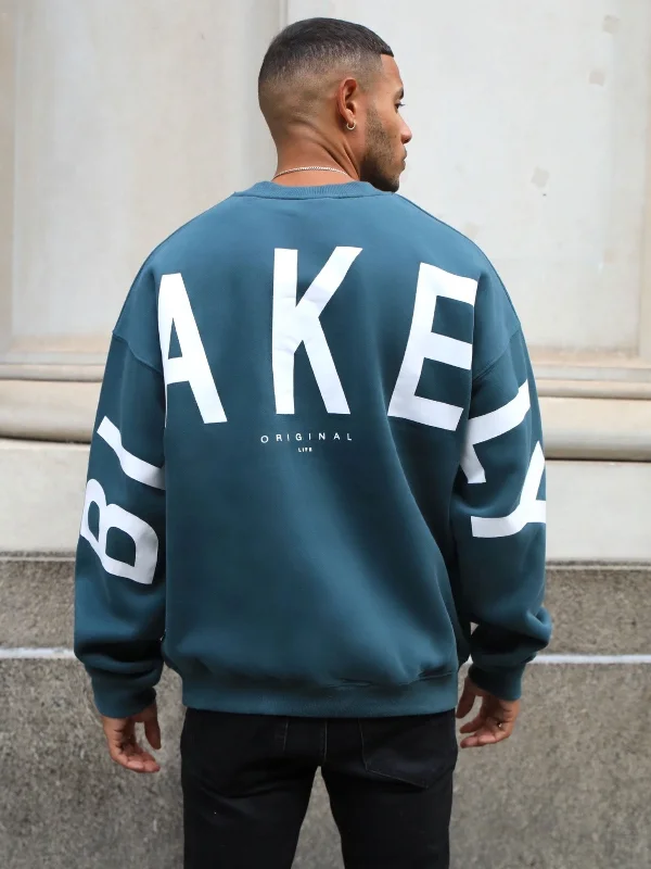 Men's Chunky Knit Fair Isle Patterned Wool Sweater in Multicolor for a Festive Holiday OutfitIdris Oversized Sweater - Teal Green Men's Chunky Knit Fair Isle Patterned Wool Sweater in Multicolor for a Festive Holiday OutfitIdris Oversized Sweater - Teal Green