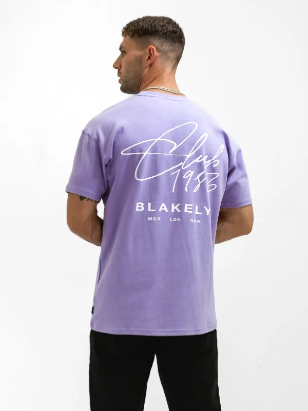 Men's button - front t - shirts with a unique artistic printClub Relaxed T-Shirt - Violet Men's button - front t - shirts with a unique artistic printClub Relaxed T-Shirt - Violet