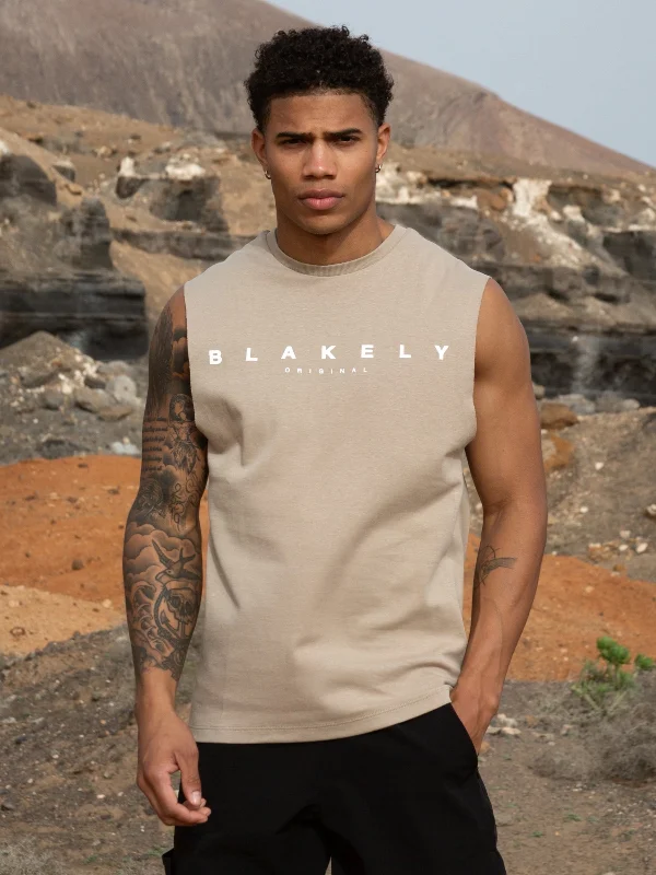 Men's distressed denim - look t - shirts with a rugged appealKuta Sleeveless Tee - Washed Khaki Men's distressed denim - look t - shirts with a rugged appealKuta Sleeveless Tee - Washed Khaki
