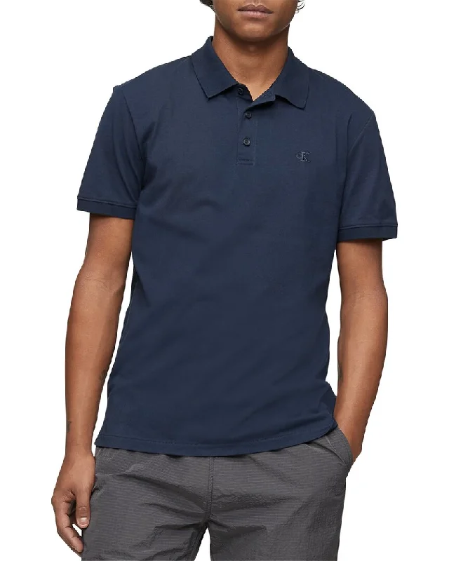 Men's polo t - shirts with a contrast collar for a preppy lookCalvin Klein Polo Shirt Men's polo t - shirts with a contrast collar for a preppy lookCalvin Klein Polo Shirt